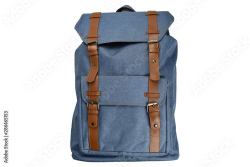 Canvas Backpack accessories isolated hipster background white. Blue with brown bag. Hand made backpack for travelers. photo