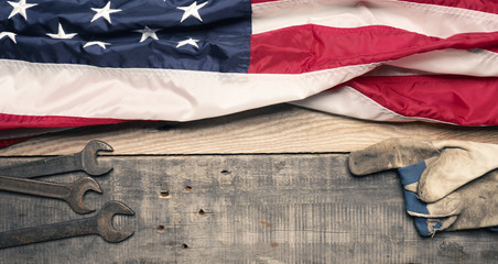 Flag of the USA with tools  on wood