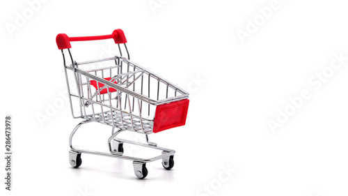 Concept Art of A Mini Shopping Cart with Bitcoin / Bit Coins or Gold Coins Inside. This is The Symbol of Digital Marketing or E-Commerce. Isolated on White Background with Copy Space for Text.