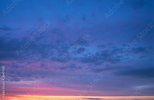 dramatic cloudy sunset sky blue hour abstract background © Mariia