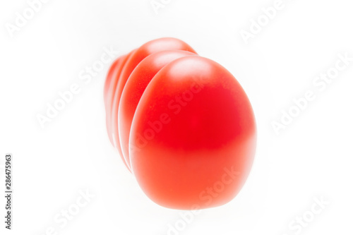 A group of fresh red cherry tomatoes