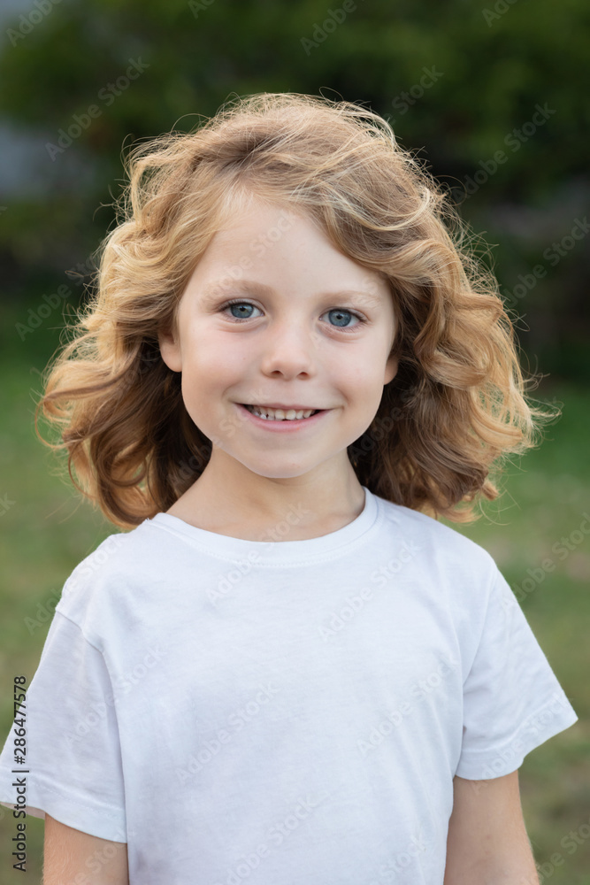 Funny blond kid with long hair Funny blond kid with long hair