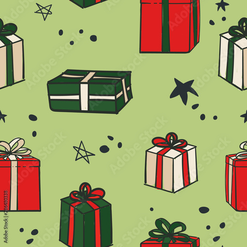 Fun and trendy doodle seamless pattern with a lot of different gift boxes with bow and stars on green background. Hand drown enless ornate for coverage, wrapping paper, fabric and other print.