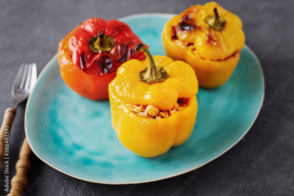 Close up of colorful stuffed veggie peppers with rice and chickpea Close up of colorful stuffed veggie peppers with rice and chickpea