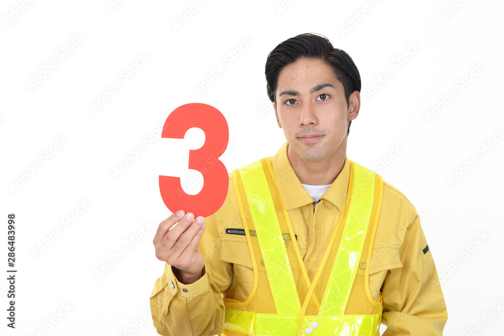 ユニフォームを着た若い労働者