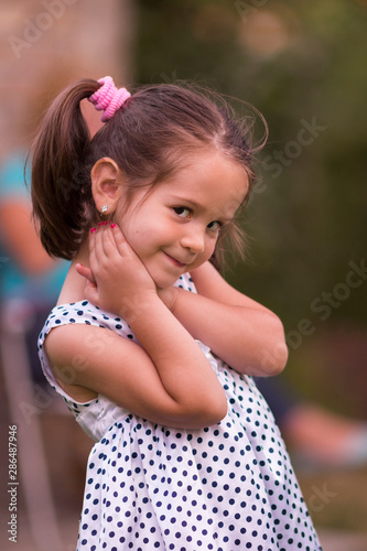 Little girl posing for a photo