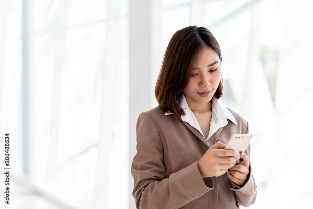 Business woman use a smartphone