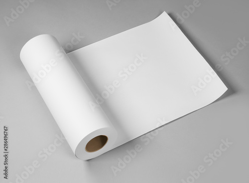 Blank white paper rolls isolated on gray background. Mockup paper for magazines, catalogs or newspapers isolated on gray backdrop, Printing house theme or wrapping paper for presents