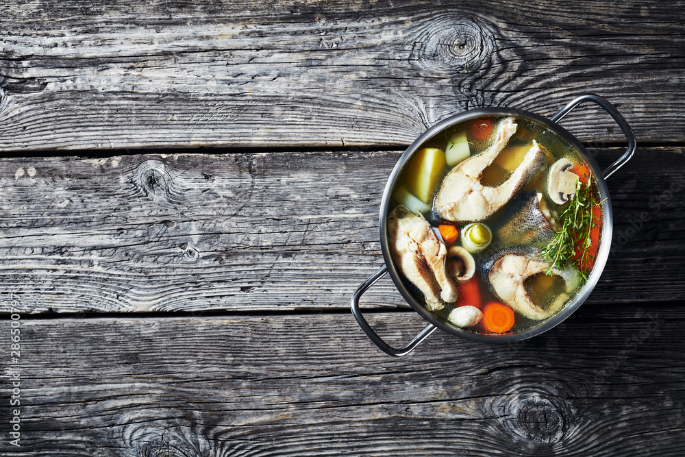 delicious spicy Trout fish soup, top view delicious spicy Trout fish soup, top view