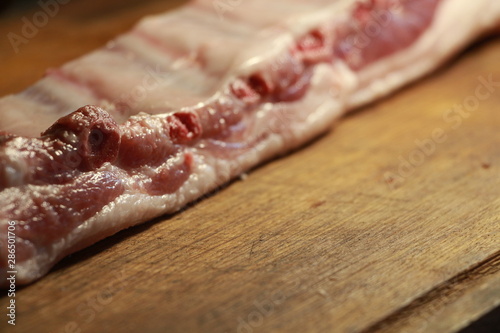 pork meat on wooden board