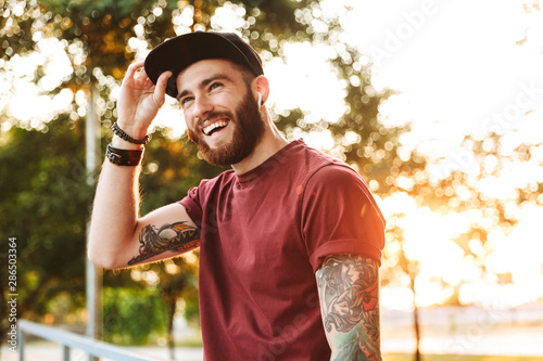 Handsome young man dressed in casual clothing photo