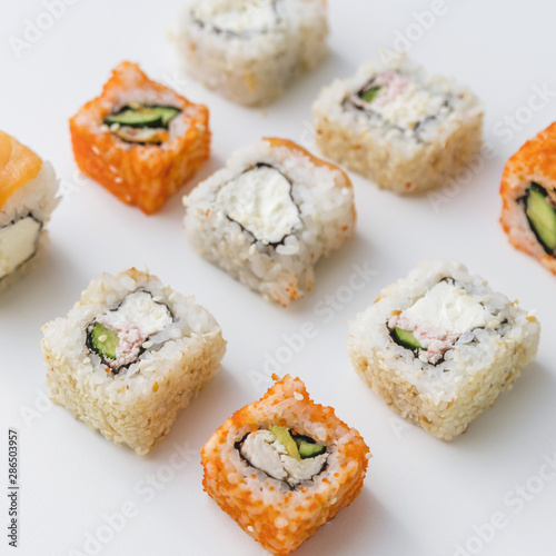 Close up view of arranged assortments of sushi