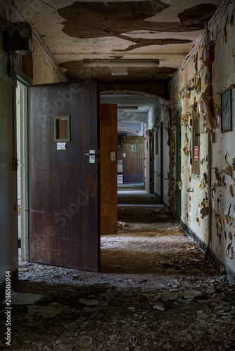Derelict Hallway with Open Doors - Abandoned Rockland State Hospital - New York