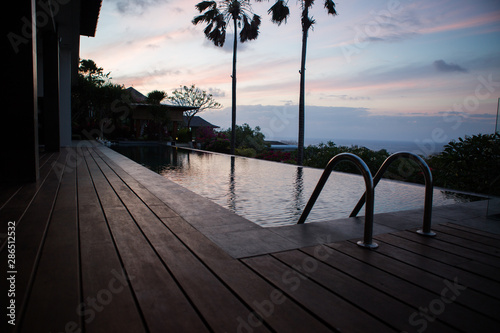 A holiday getaway and enjoying a sunrise swim in infinity pool.
