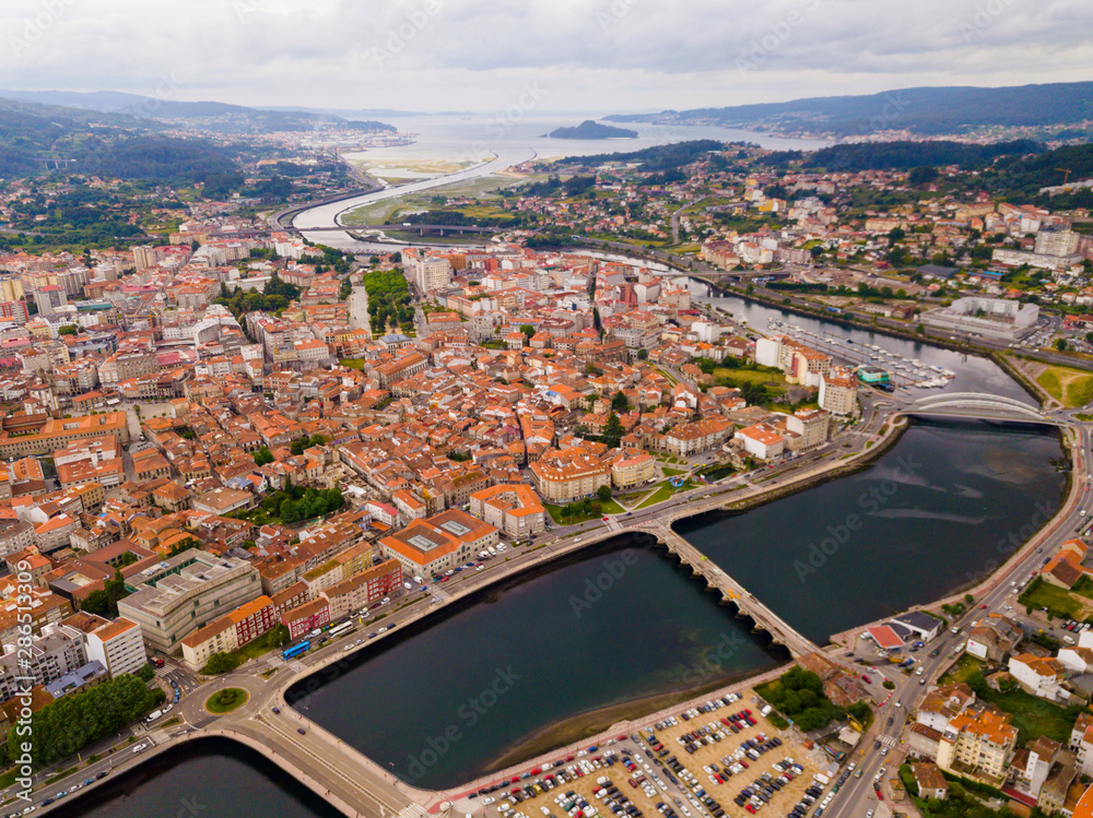 Pontevedra cityscape with a modern apartment buildings and sea bay