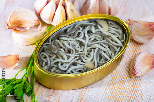 Preserves of eel fry in garlic brine photo