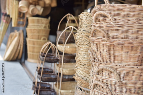 Wallpaper Mural Wicker marketRattan basket.Rattan or bamboo handicraft hand made from natural straw basket. Torontodigital.ca