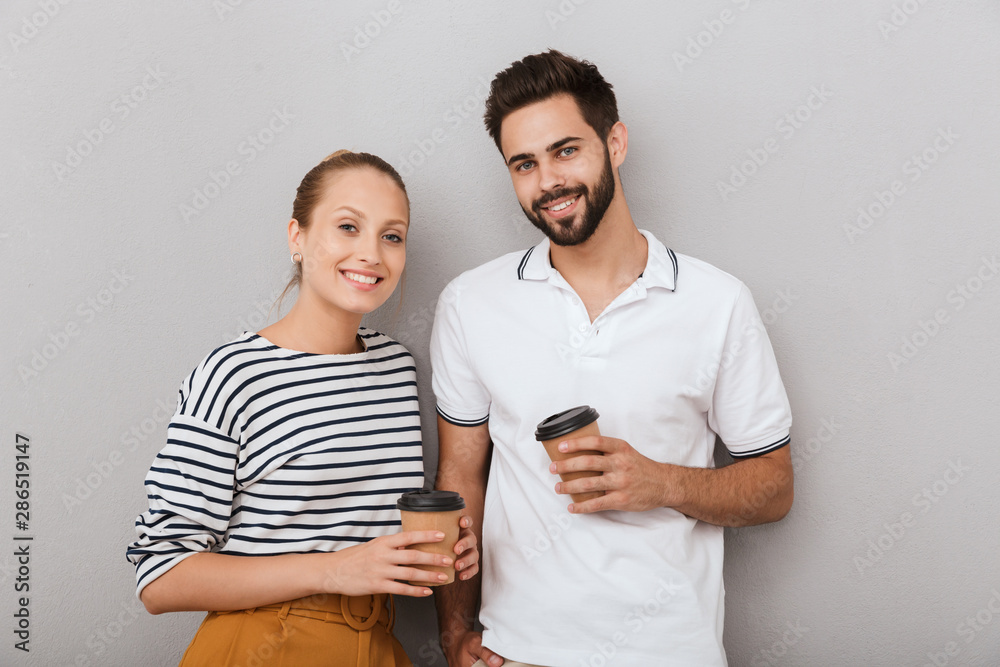 Beautiful young couple wearing casual clothing standing Beautiful young couple wearing casual clothing standing