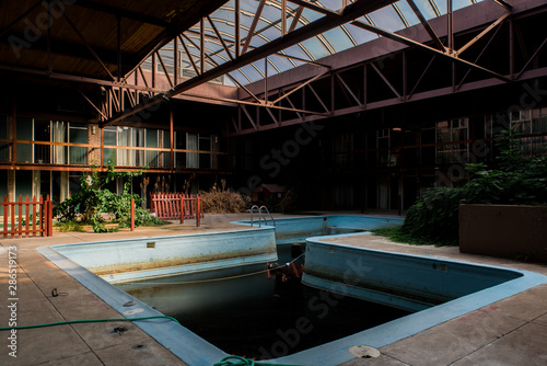 Derelict Swimming Pool with Skylights - Abandoned Motel - Pennsylvania photo