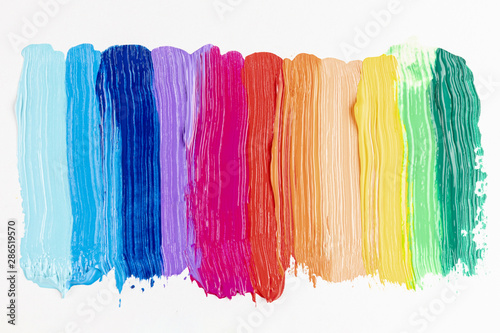 Colorful paint strokes on white background