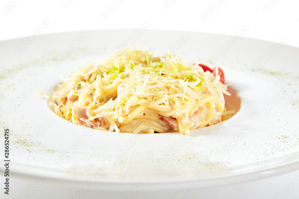 Delicious Spaghetti Carbonara with Grated Parmesan Cheese Isolated
