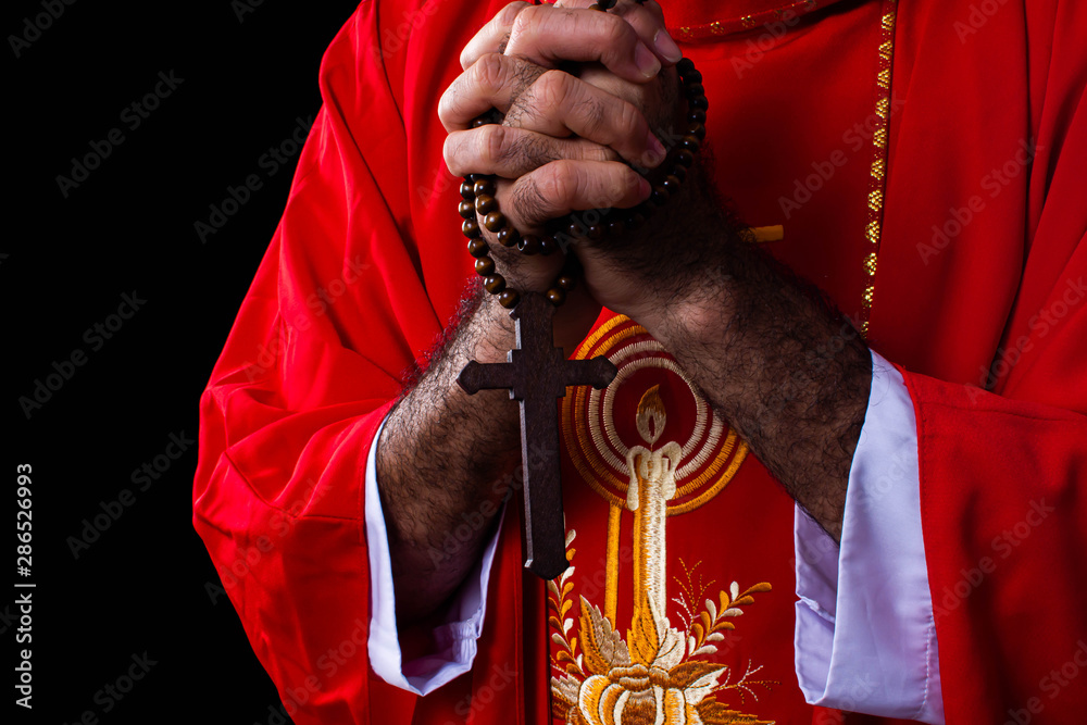 Portrait of praying with cross in christian religion