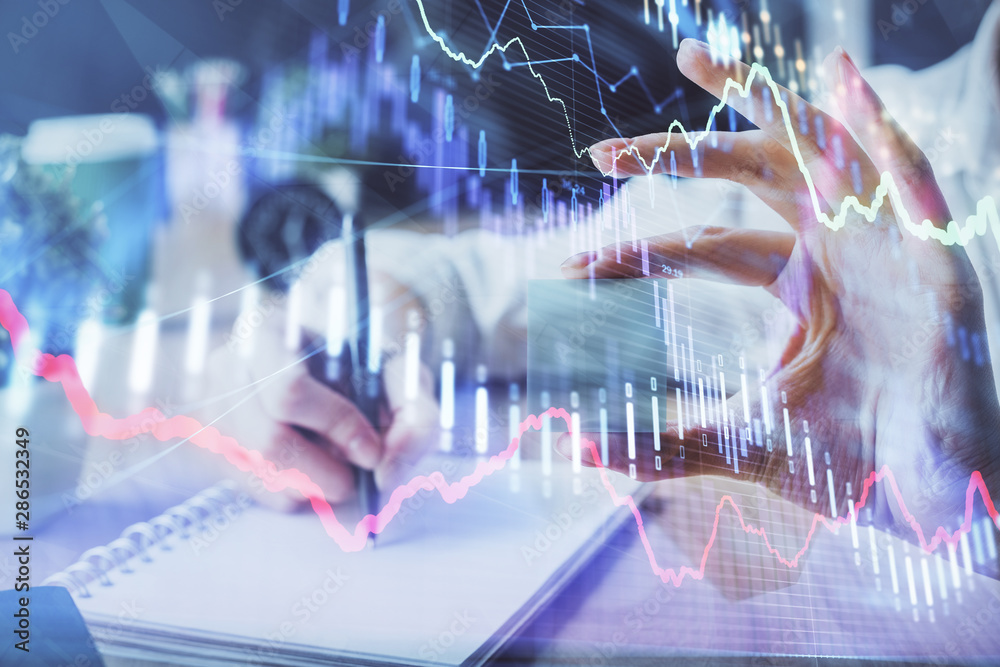Forex chart displayed on woman's hand taking notes background. Concept of research. Multi exposure