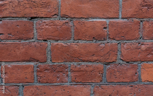 Brick wall. The texture of the building. Red brick