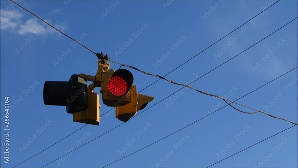 Flashing red traffic light on wire