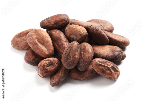 Pile of aromatic cocoa beans isolated on white