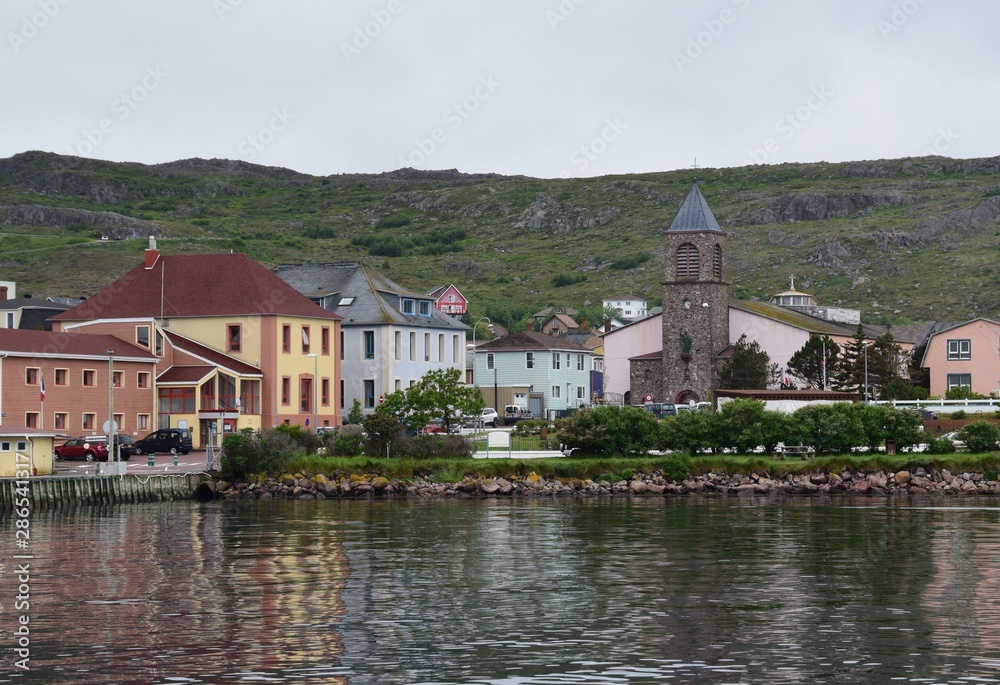 view from the ocean towards the harbor front and cathedral at Saint Pierre, Saint Pierre and Miquelon