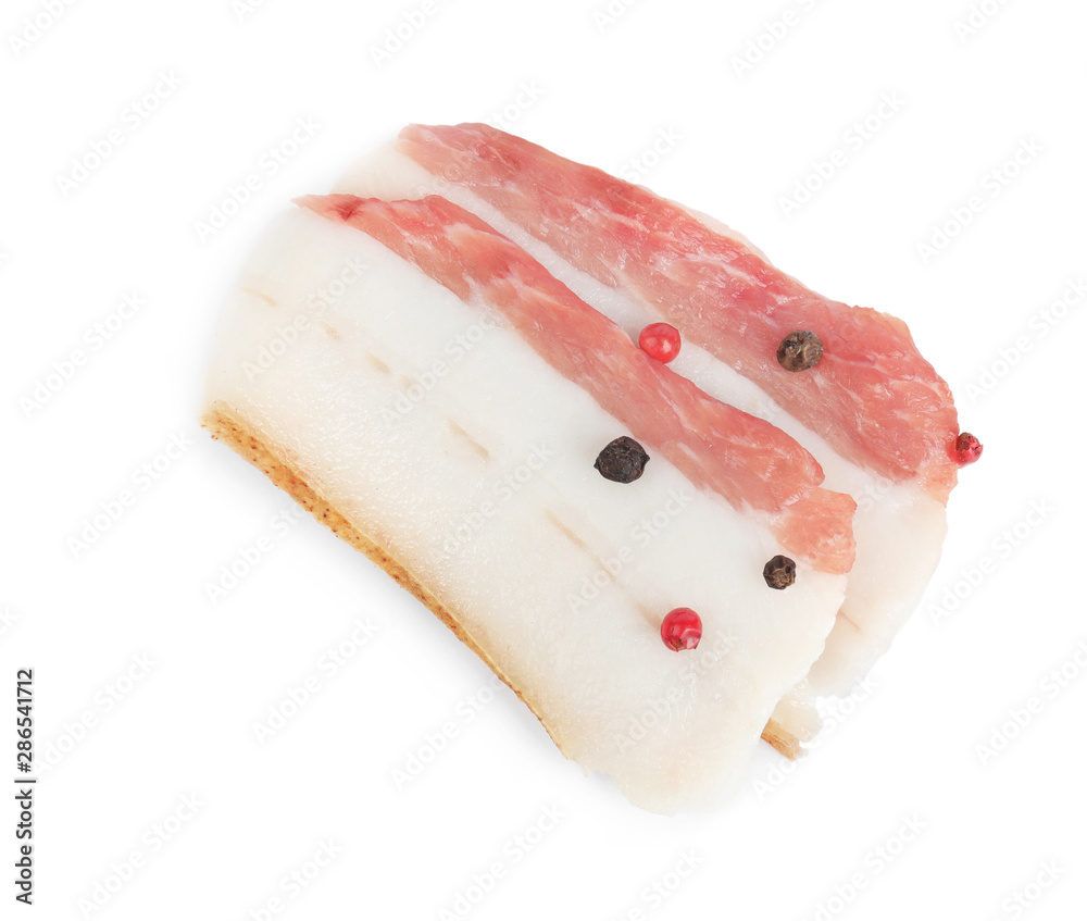 Slices of pork fatback with pepper isolated on white, top view