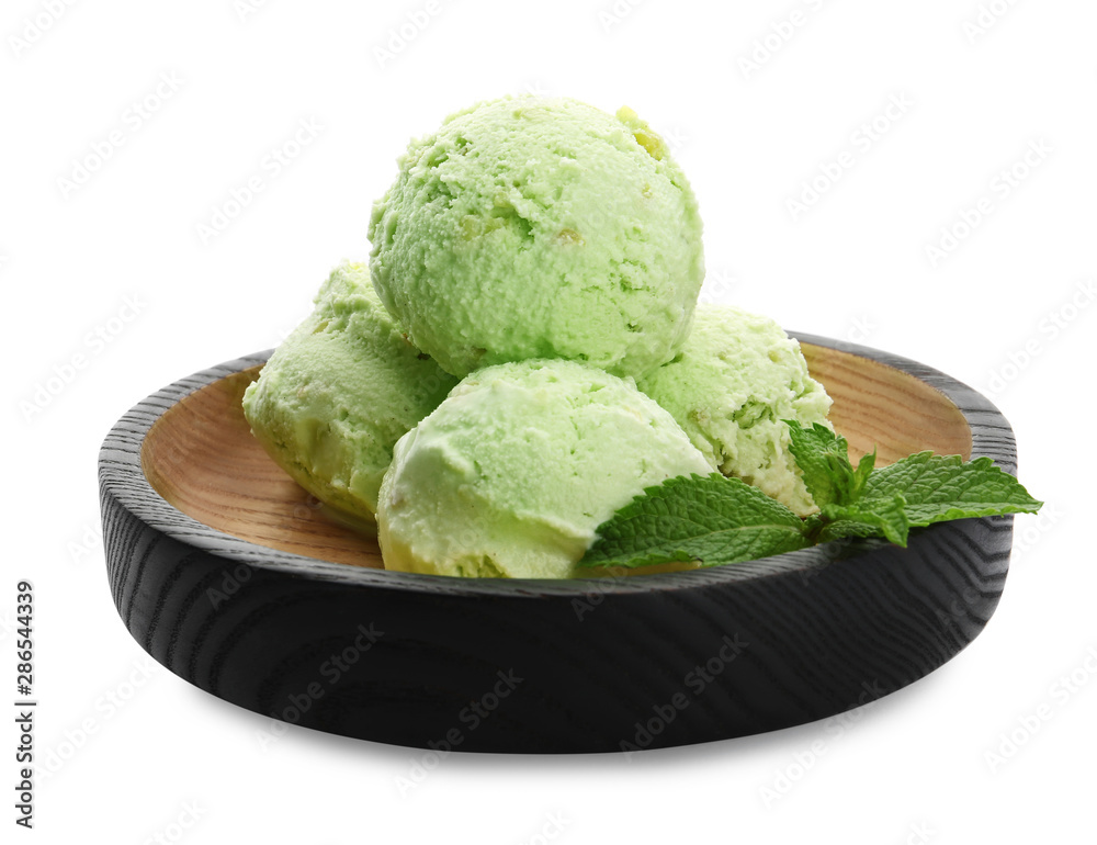 Plate of delicious pistachio ice cream on white background Plate of delicious pistachio ice cream on white background