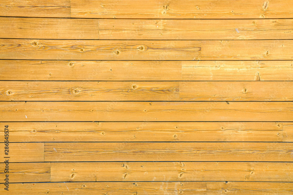 Fototapeta premium Background of varnished natural wood boards.