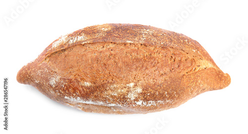 Loaf of fresh bread on white background, top view