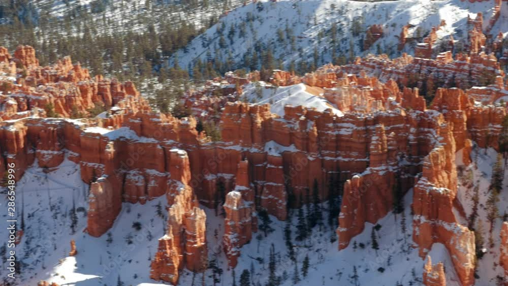A panning shot of snowy Bryce Canyon National Park in winter A panning shot of snowy Bryce Canyon National Park in winter