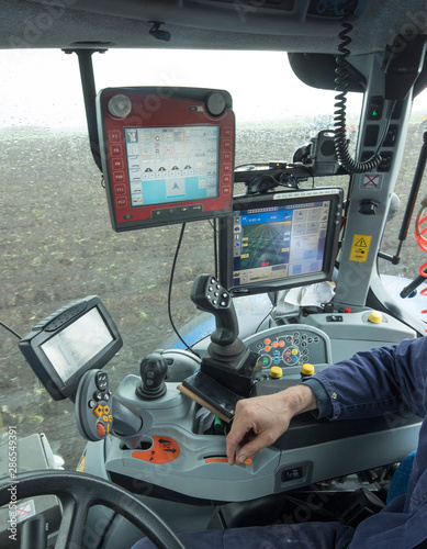 Tractor with GPS system for Planting potatoes. Agriculture. Farming Machines. Netherlands.