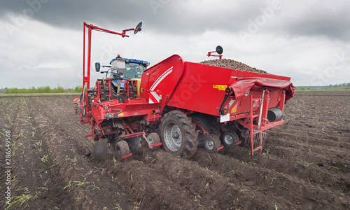 Planting potatoes. Agriculture. Farming Machines