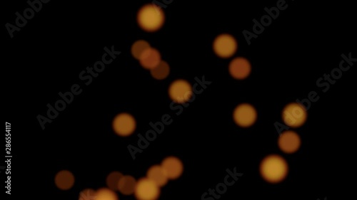 abstract bokeh background with many flying blurred golden lights  (4K)