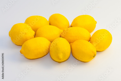 yellow lemons on white background