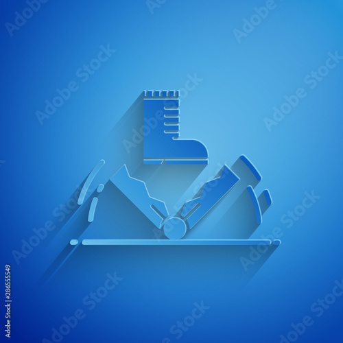 Paper cut Trap hunting icon isolated on blue background. Paper art style. Vector Illustration