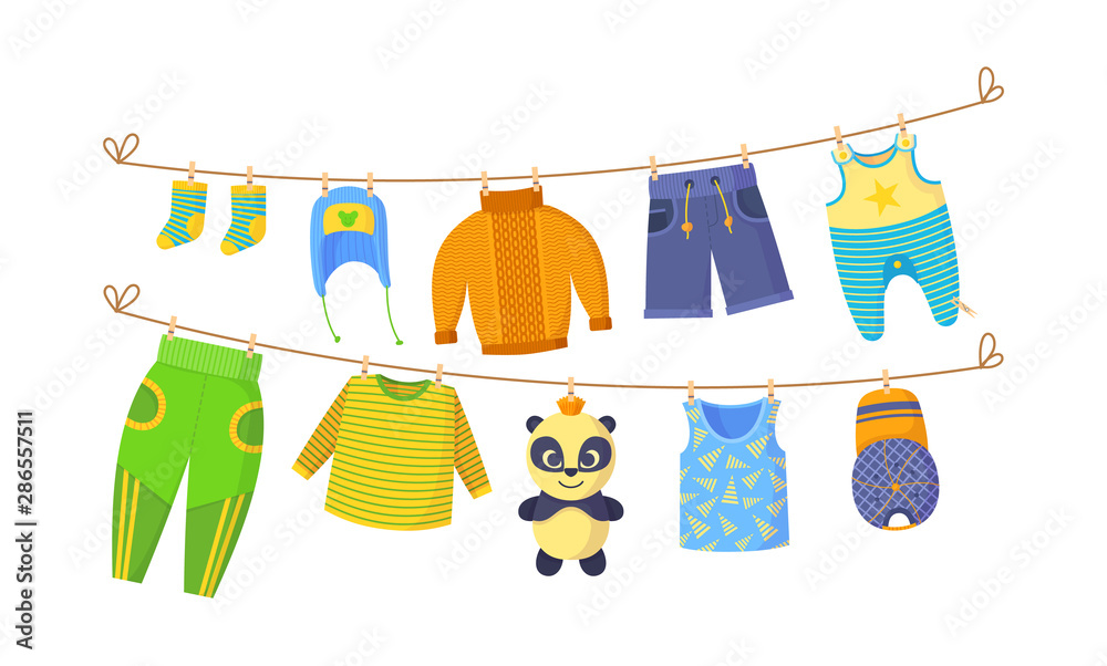 Clean child kids small clothes, cloth rope. Kids dry clothing on
