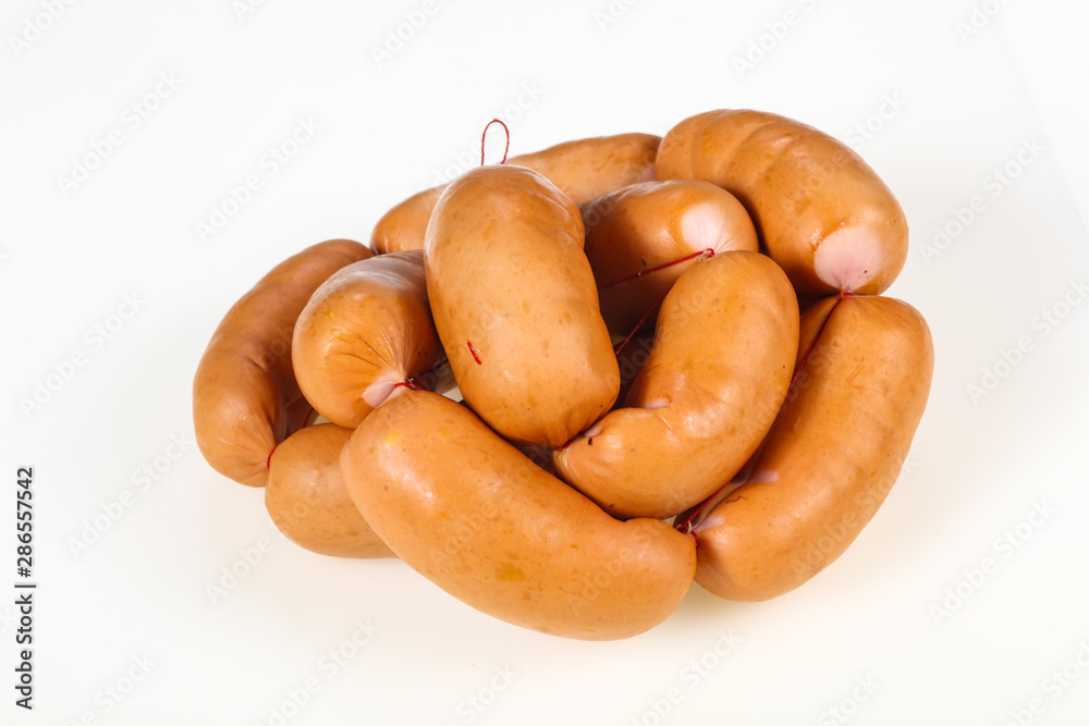 Tasty meat sausages over white background Tasty meat sausages over white background