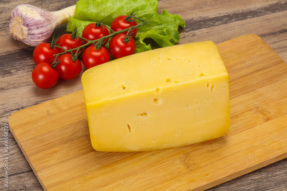 Hard yellow tasty cheese brick Hard yellow tasty cheese brick