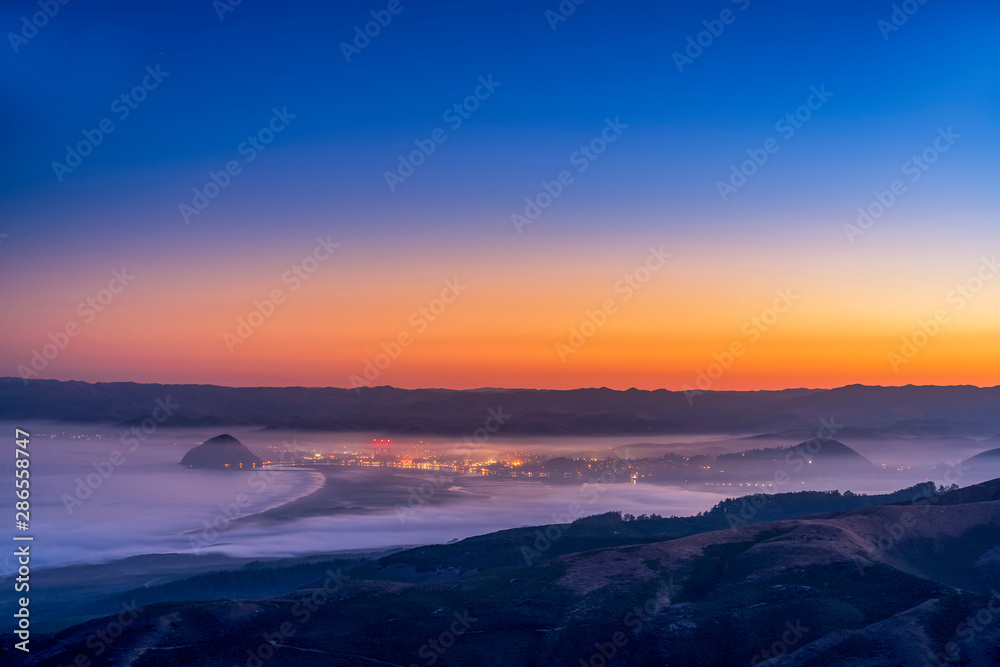 Panorama of Sunset over Mountains, Ocean, Town