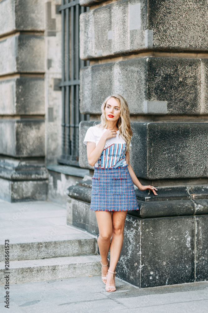 attractions significant places of Germany. beautiful smiling girl in Berlin.