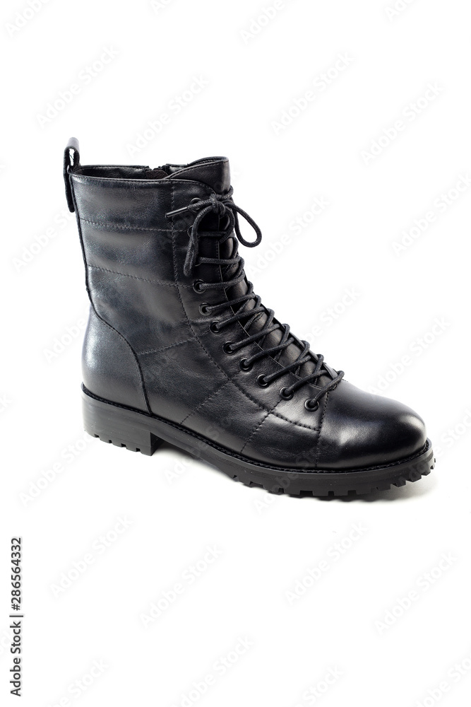 black leather ankle boots isolated on white background