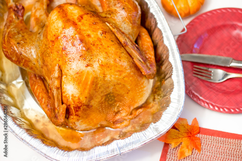 Overhead Angle of Roasted Turkey in a Foil Roasting Pan