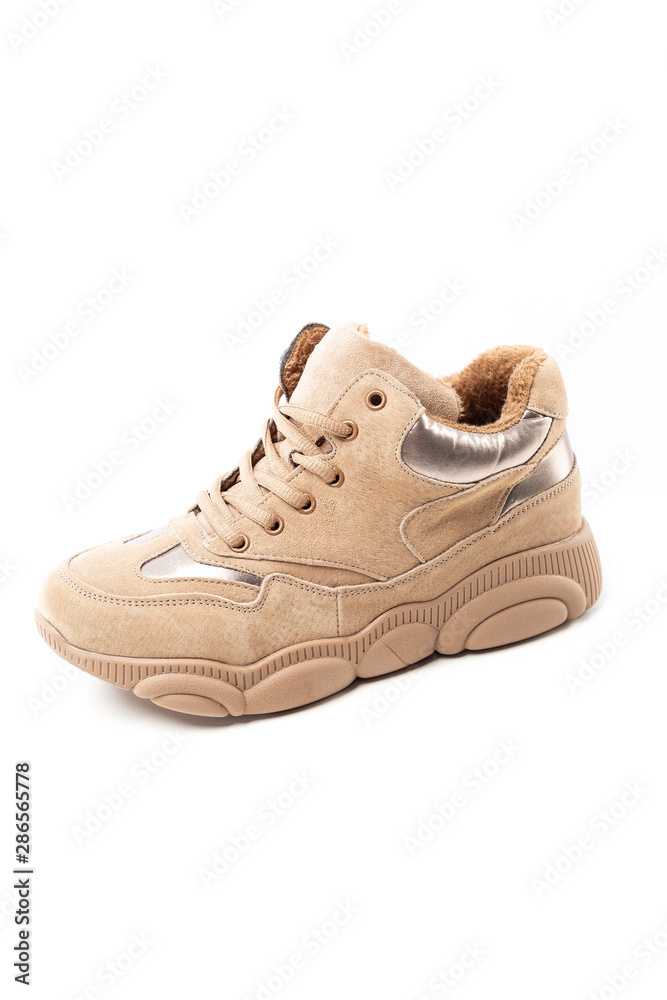 suede sneakers, suede sports shoes isolated on white background
