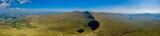 Aerial drone panorama of Corn Du and Pen-y-Fan mountains in the Brecon Beacons, South Wales, UK